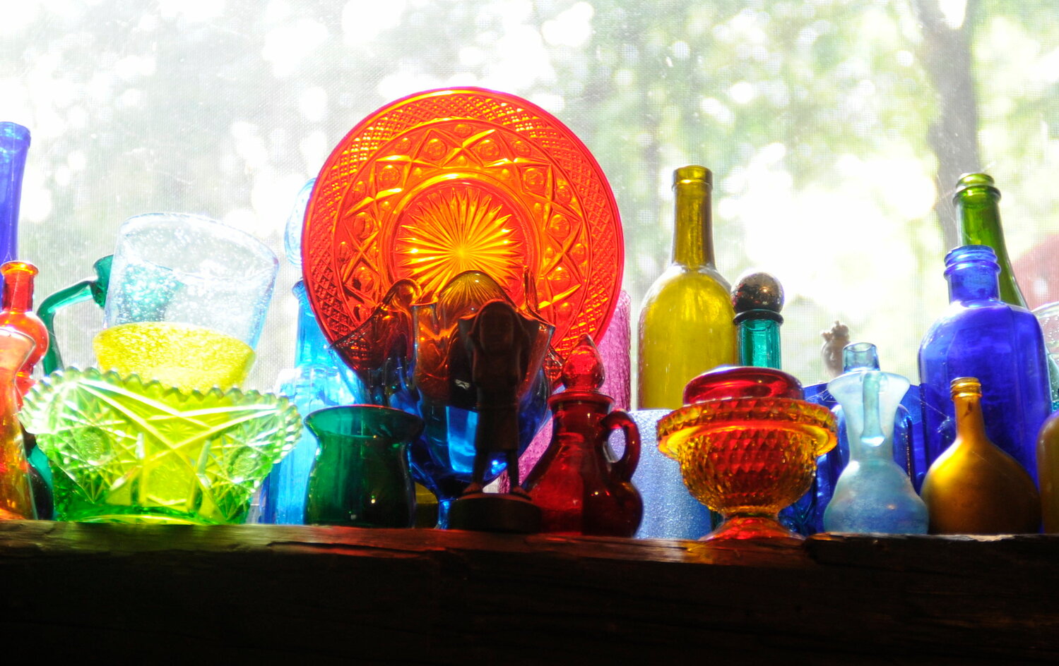 Light shines through glass in Nancy Wells' studio.